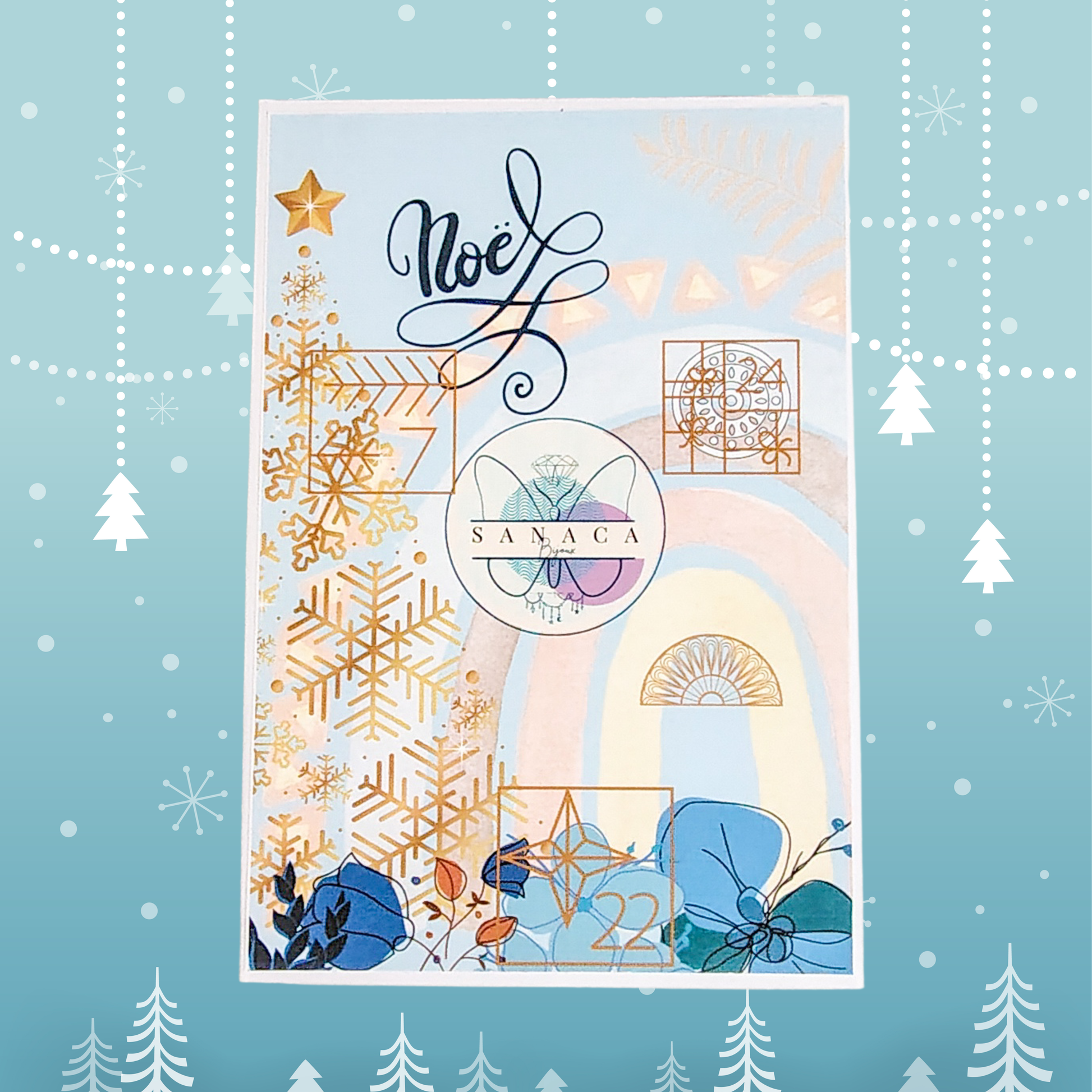 devant de la boite du calendrier de l'avent ton bleu ciel et fonce avec du dore